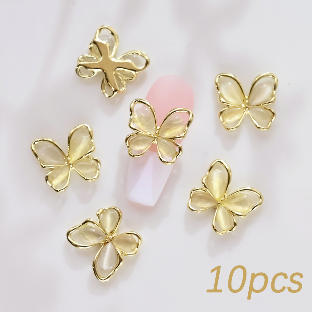 10Pcs Siver White Crystal Butterfly Nail Charms 3D Hollow Cat's Eye Alloy Zircon Nail Gems Luxury Diamond Butterfly Nail Charms: Ivory