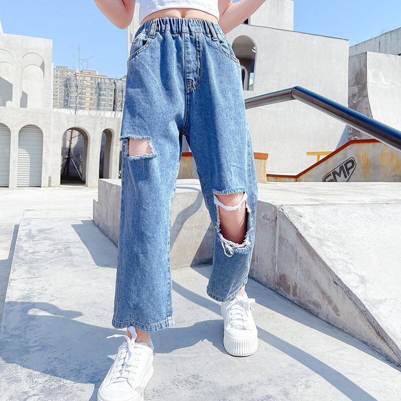New Teen Girl Fashion pantaloni strappati in Denim con foro in cotone 2021 estate bambini colore blu vita alta Jeans larghi alla caviglia