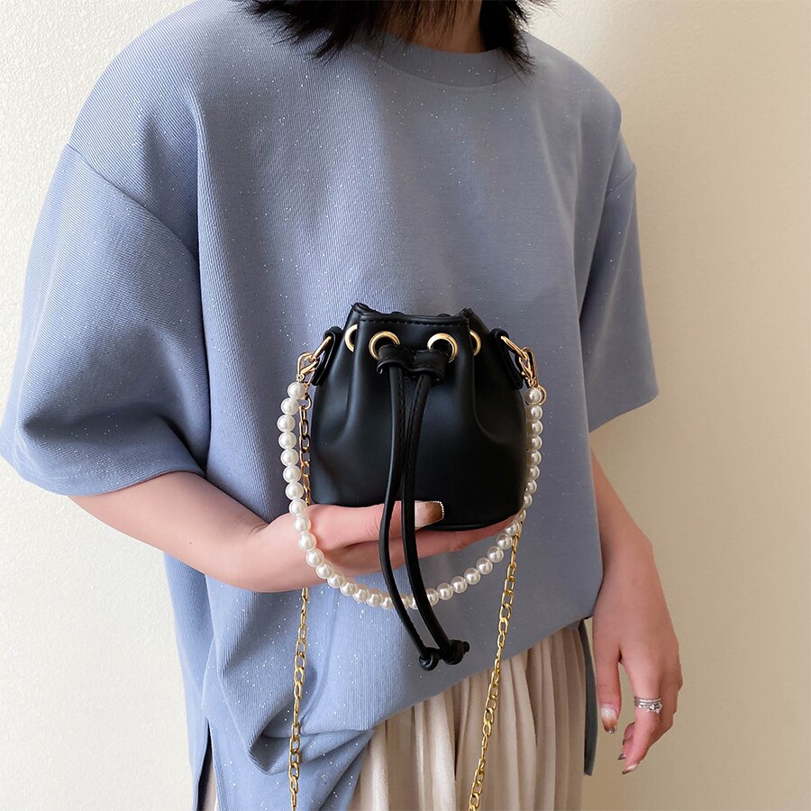 Dames mini emmertas parel handtas pu leer effen kleur ketting schoudertassen kleine schattige dames crossbody handtas
