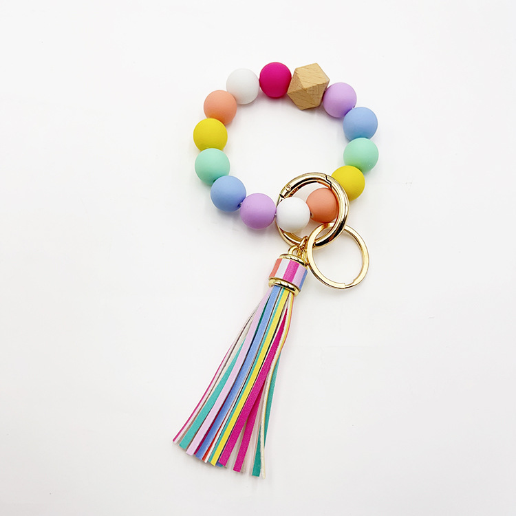 Llavero con cuentas de silicona para hombre y mujer, pulsera con cuentas y borlas para colgar carteras: Azul claro