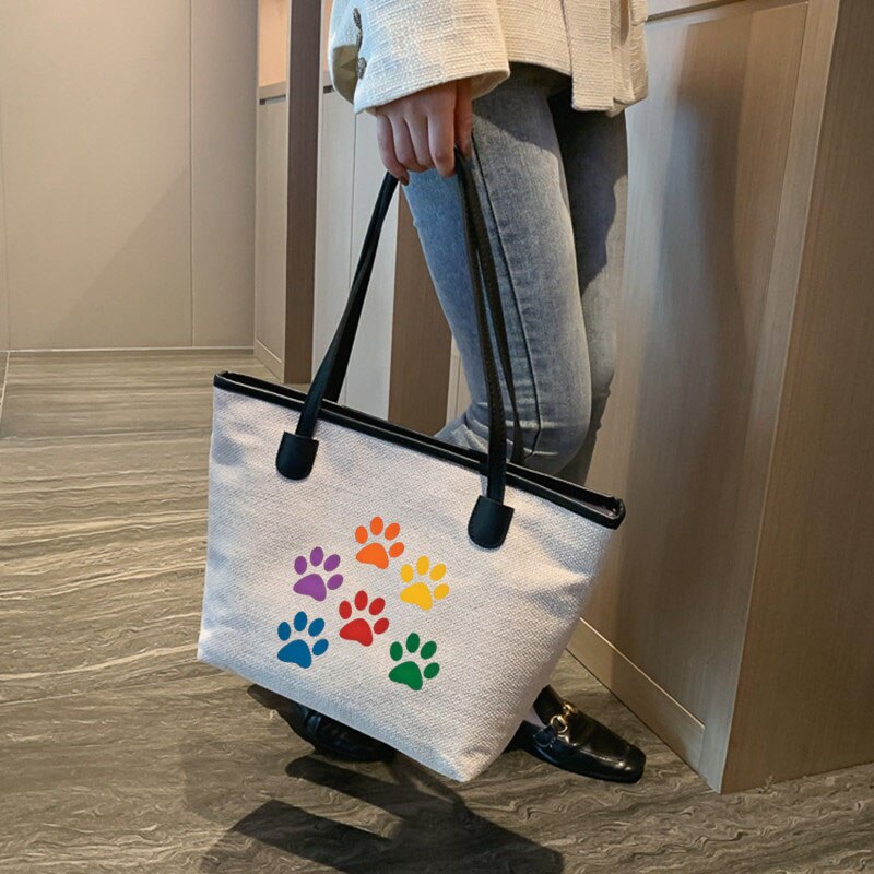 Bolso de lona con estampado de patas de colores para perro y gato: white