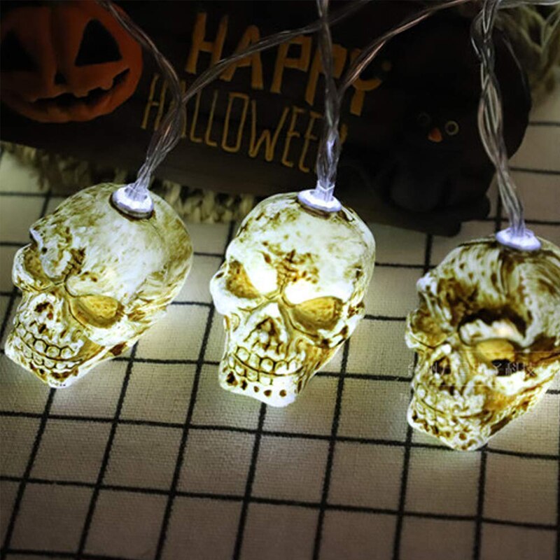 Halloween lichtsnoer met 10/20 led-lampjes, een lichtsnoer met led-lampjes, een pompoen, een skelet, een bot, een spook, een vleermuis en een spin.: Schedel 2 / 1.5m 10 geleid
