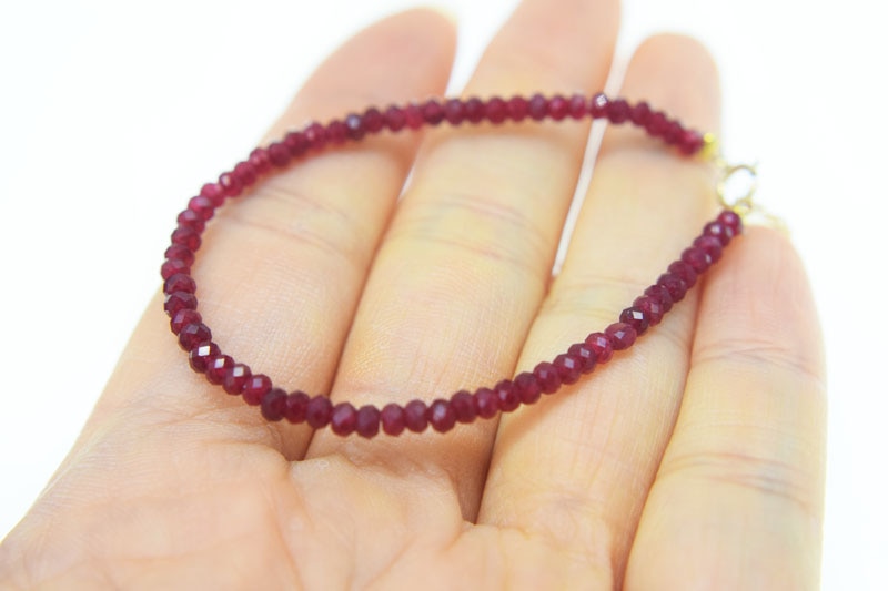 red ruby roundel faceted 3*2mm +14kplated clasp bracelet 19cm