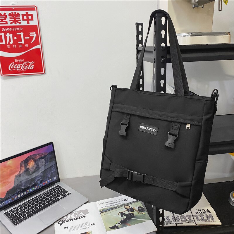 Multifunctionele Retro Ins Harajuku Student Wilde Grote Capaciteit Klasse Messenger Bag Vrouwelijke Retro Tooling Schoudertas: Black