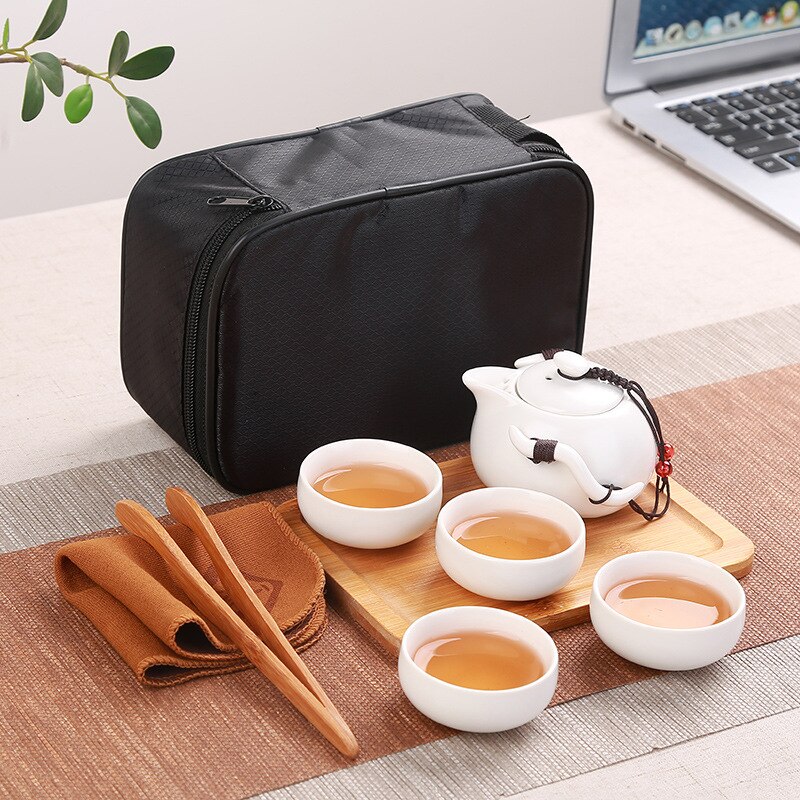 Curso conjunto de chá saco portátil, rápido convidado kungfu cerâmica, um pote, quatro xícaras de presentes do negócio do escritório
