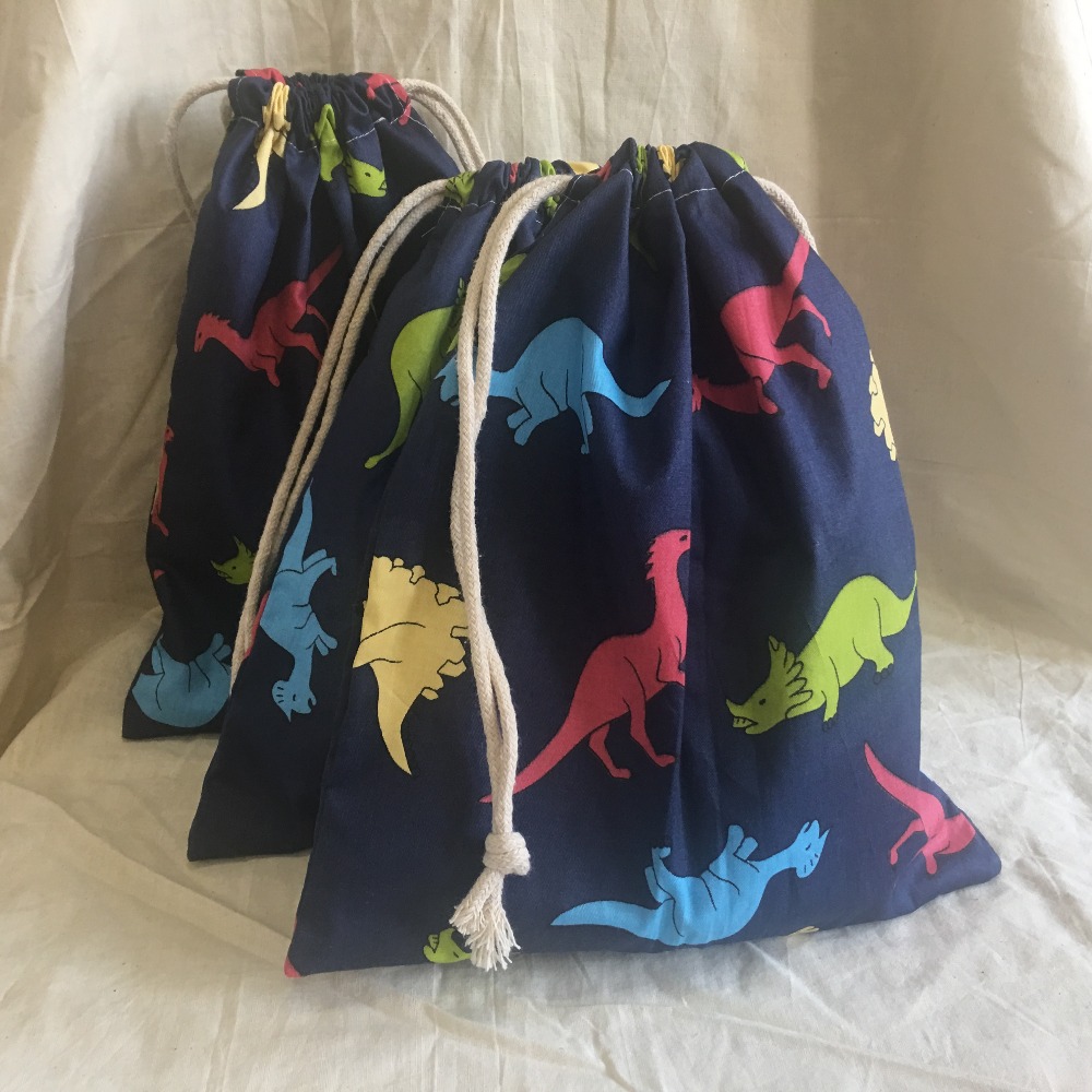 Sac de de fête en coton avec cordon de serrage Eco imprimé dinosaure bleu marine YL311b