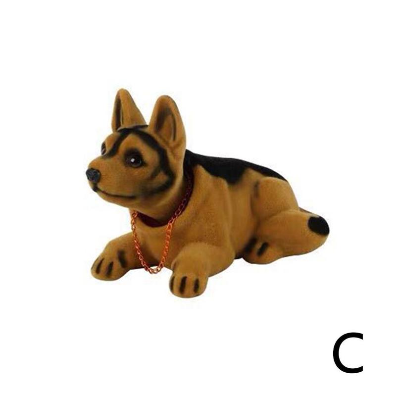Dukke nikkende hund ryster på hovedet harpiks simulation bil hundelegetøj instrumentbræt dekoration bil ornament sød bil tilbehør: C