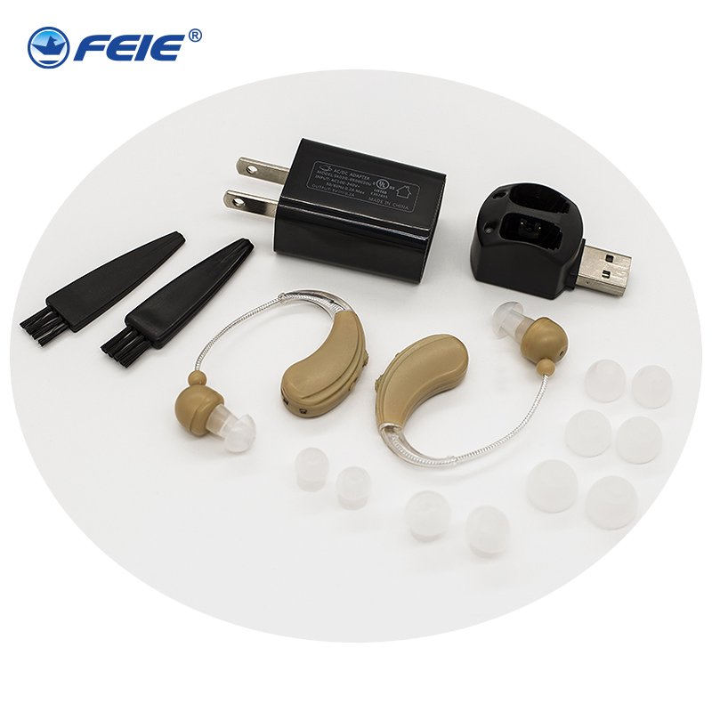 Audífonos recargables auriculares para sordos cargando en ordenador S-109S