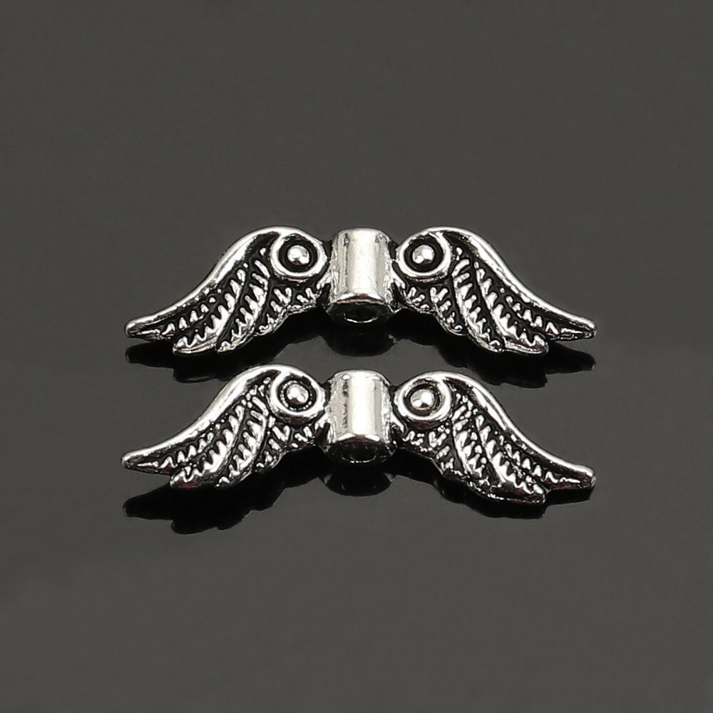 DoreenBeads Retail 50 Silver Color Angel Wing Charm Spacers Beads 23x7mm