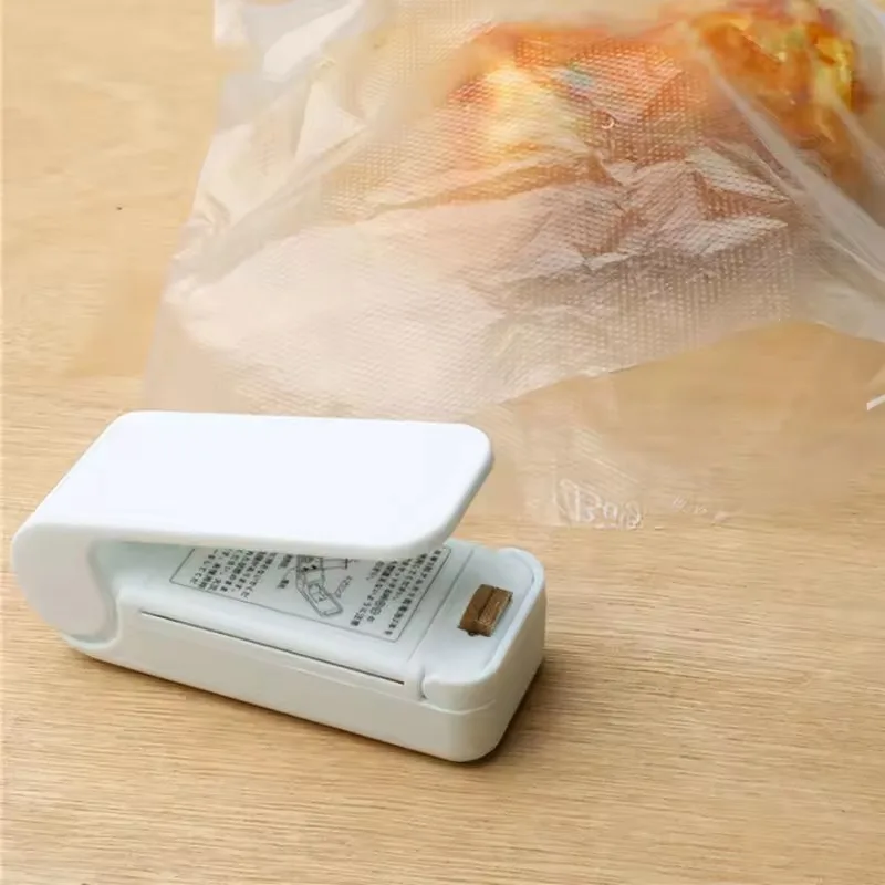Mini värmepåseförslutningsmaskin hushållsmanuell värmeförslutare kökstillbehör bärbar termisk plastförpackningsmaskin påsförslutning