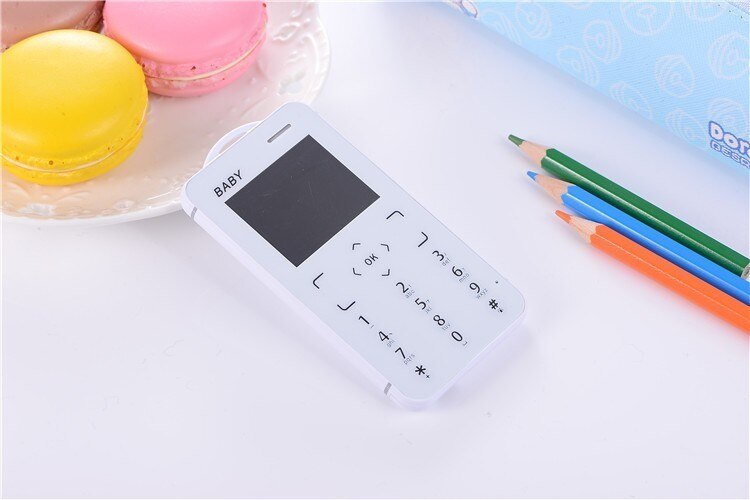 T5 Small Slim Size Cellphone 1.8" Ultra Thin Card Pocket Student MP3 Low Radiation Push Button Mini Mobile Phone: Standard / White