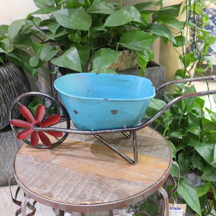 small handcrafted rustic retro metal planter cart