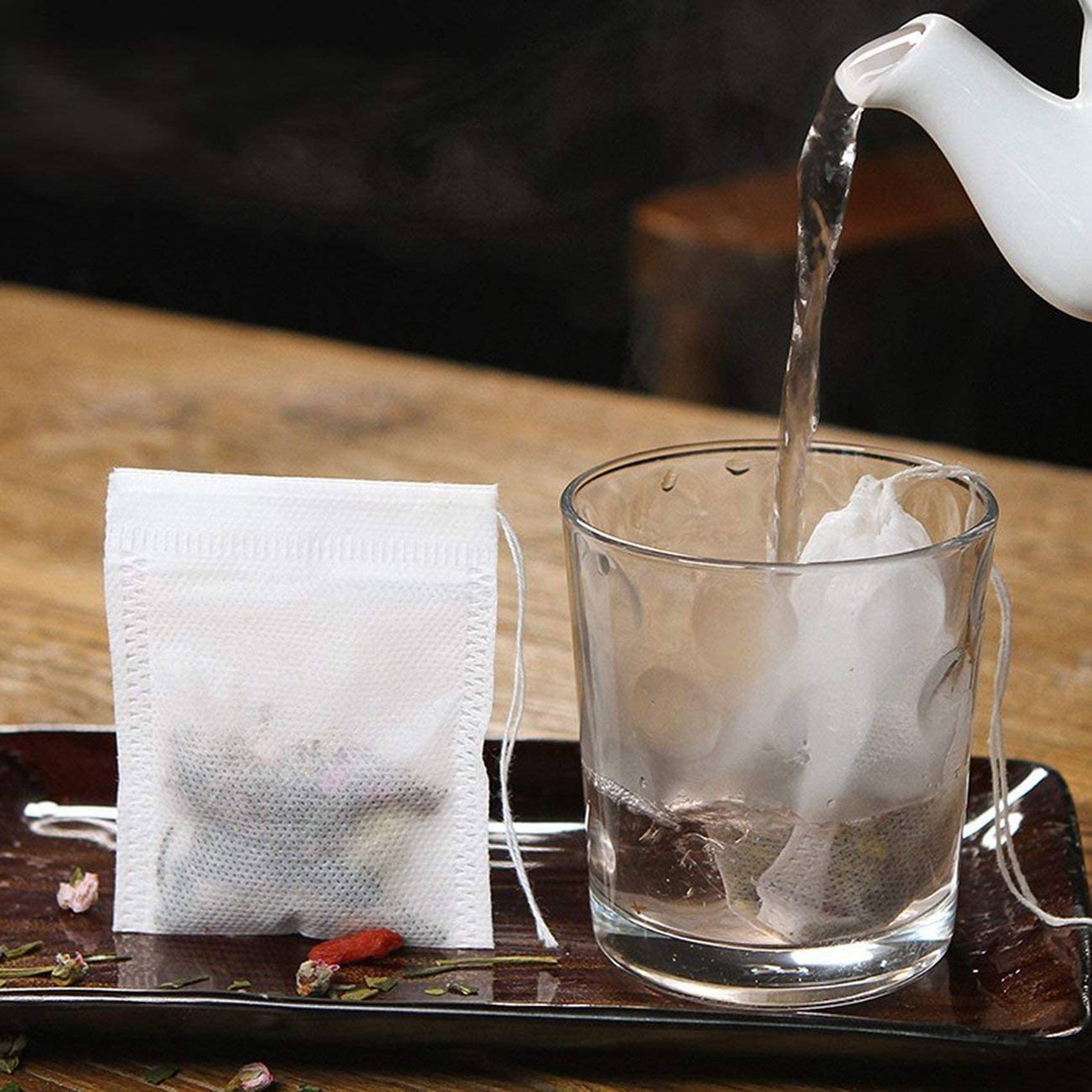 100 pezzi di sacchetto filtro monouso per bustine di tè, sigillato con corda, bustina di tè con filtro in tessuto Non tessuto