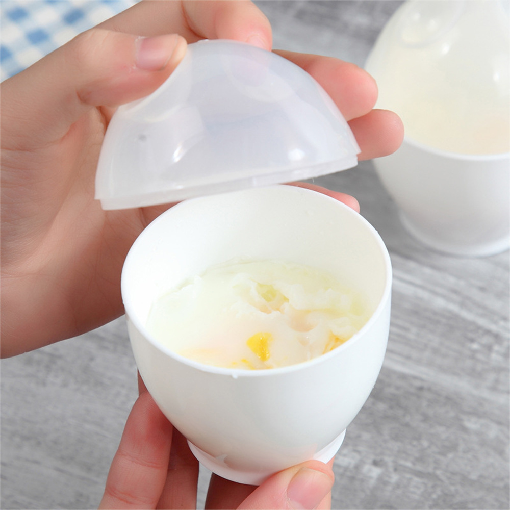 Neue gesündliche Mikrowelle Eierkocher Kessel Hersteller Mini tragbare schnelle Eierkochtasse gedämpfte Küchenutensilien zum Frühstück