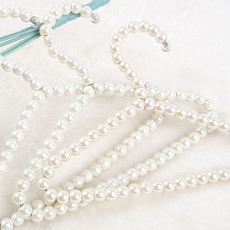 Pack de 3 perchas elegantes de plástico con perlas blancas a la para niños y mascotas.