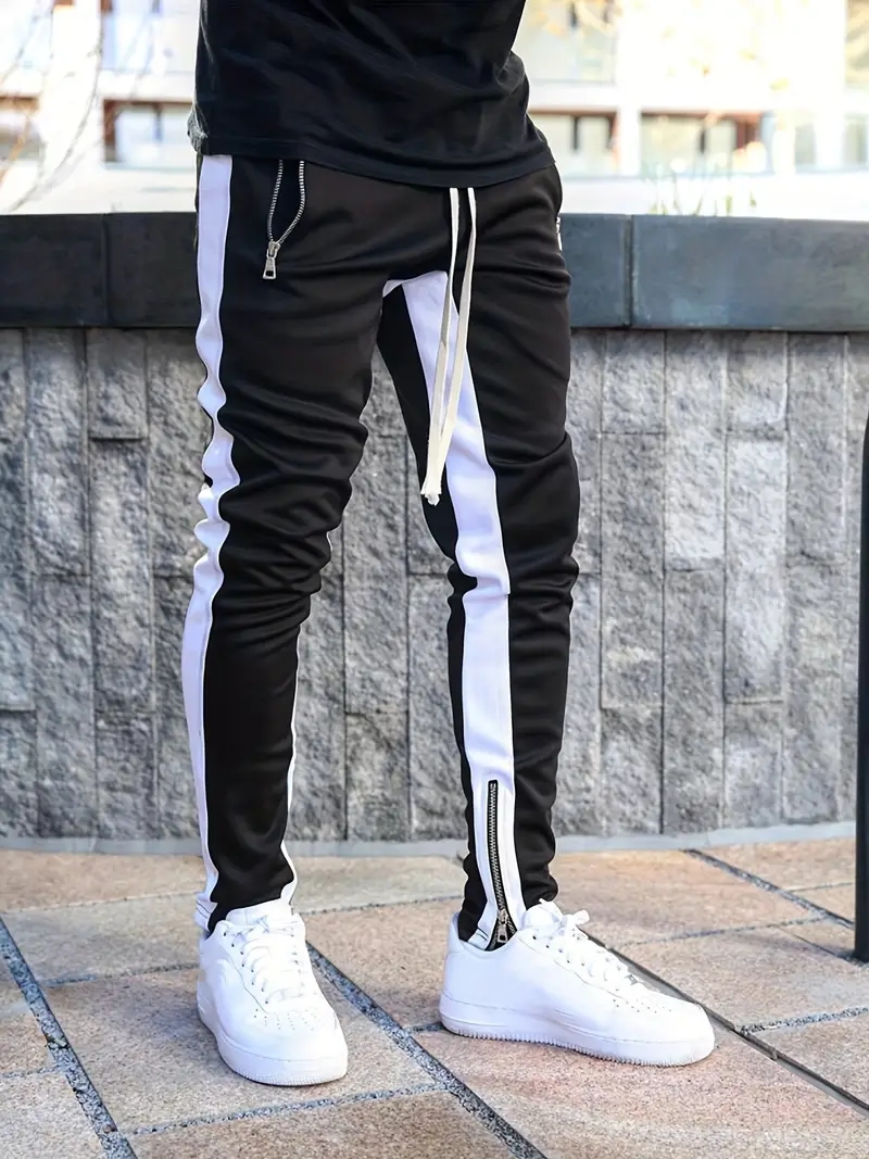 Herr sweatshirts joggingbyxor herr casualbyxor herr snygga färgblock dragkedjefickor dragsko sport skinny byxor byxor: M / Svart