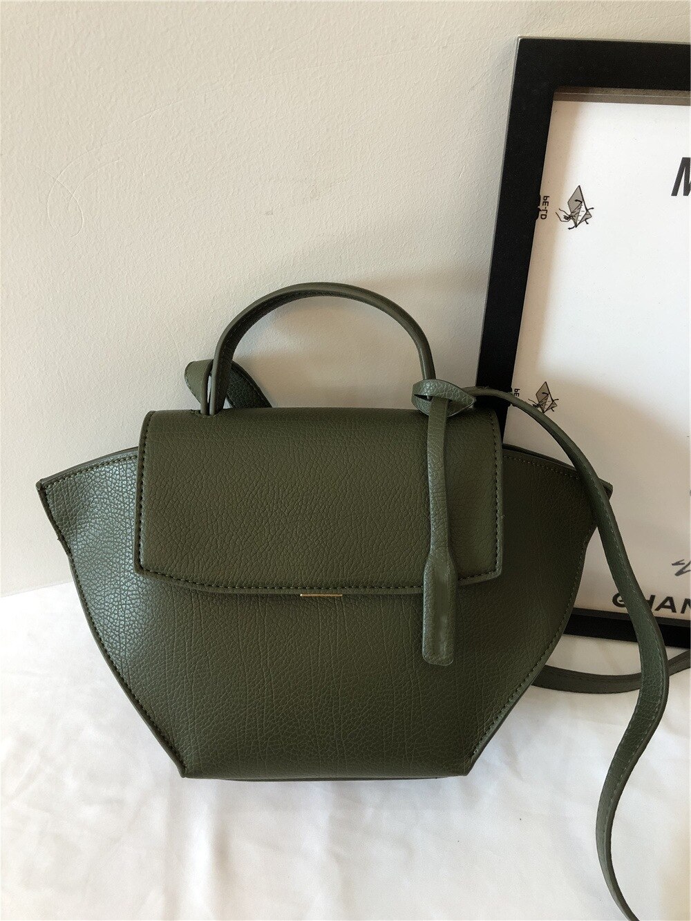 SOUTHLAND Hand held flap wing bag medium single sh... – Grandado