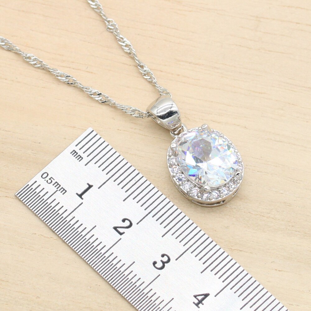 Set di gioielli classici Color argento con zirconi bianchi per bracciale da donna orecchini lunghi collana con ciondolo anello regalo