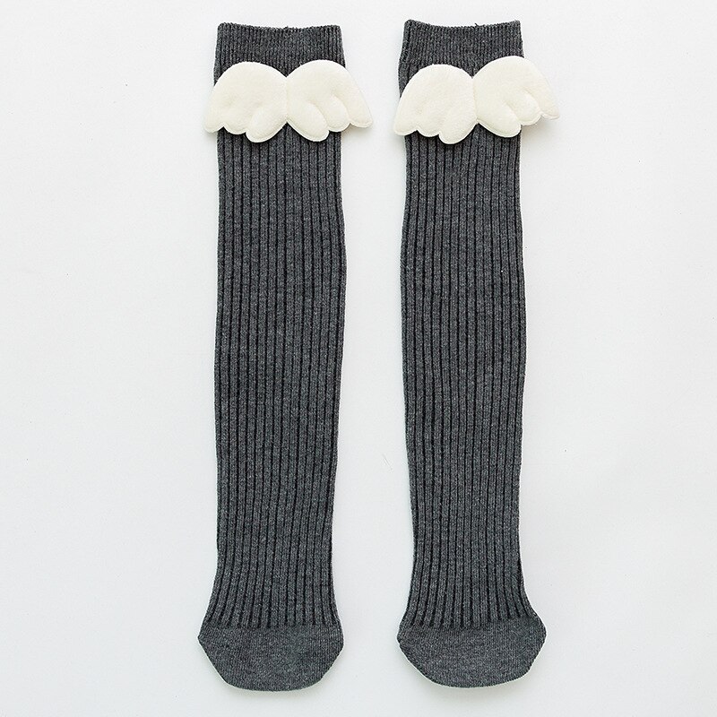 Śliczne dzieci skarpetki anioł skrzydło maluchy dziewczyny chłopcy długie miękkie bawełniane skarpety dziecięce solidne dziecko dla 0-8 lat skarpety robić kolan