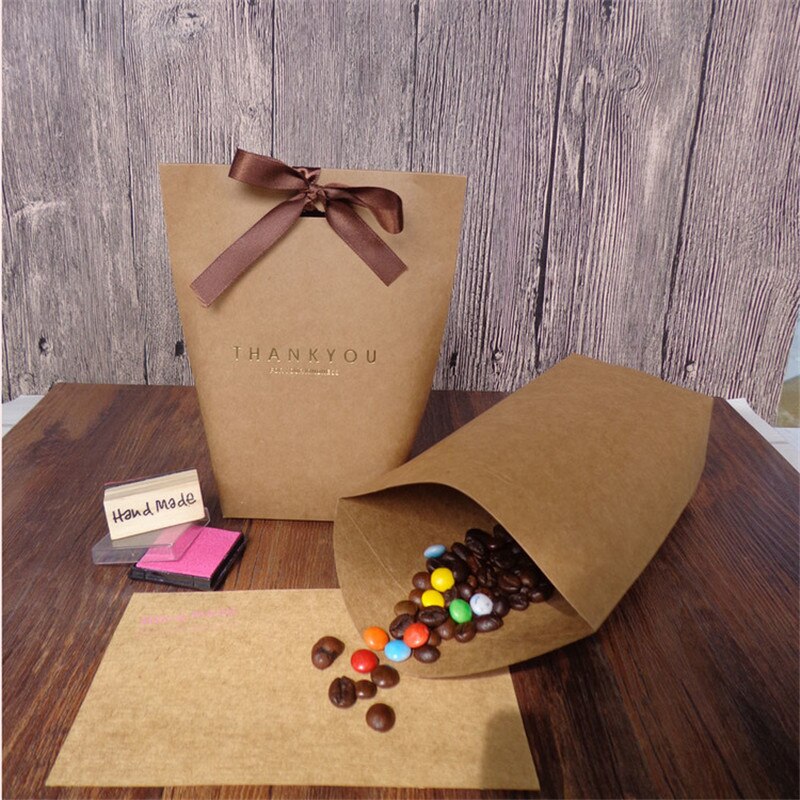 50 Stks/partij Zwart Wit Bronzing Franse "Merci" Papier Candy Bag Dank U Bonbondoos Pakket Bruiloft Verjaardag party Favor Tassen