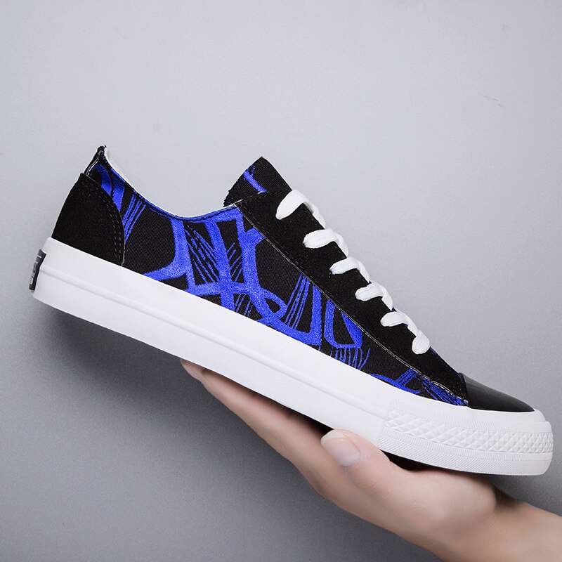 nouveaux hommes toile chaussures vulcanisé chaussures conseil chaussures décontracté graffiti marée chaussures bas-haut sport chaussures pour hommes