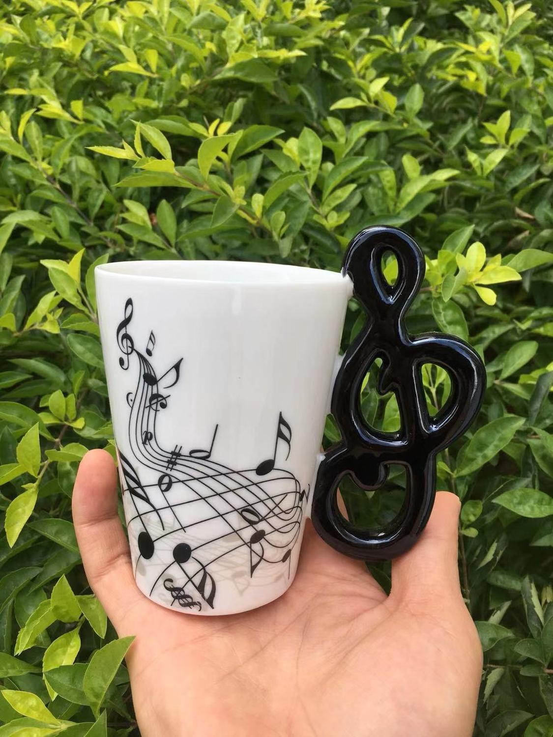 Instrumento musical de cerámica de , tazón taza con mango,