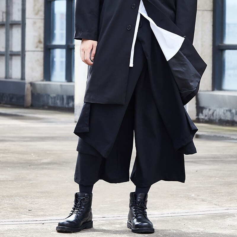 Hombres Japón Streetwear Hip Hop estilo punk gótico de color negro Harem pantalón masculina empalme suelta pierna ancha Falda pantalón Kimono