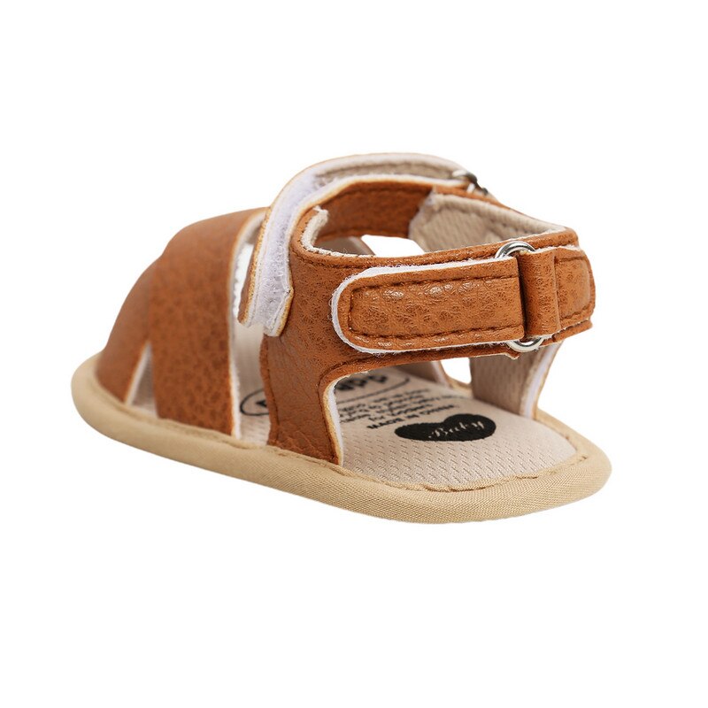 Sandalias de cuero para bebés, niños y niñas, zapatos planos antideslizantes con punta abierta y correa entrecruzada