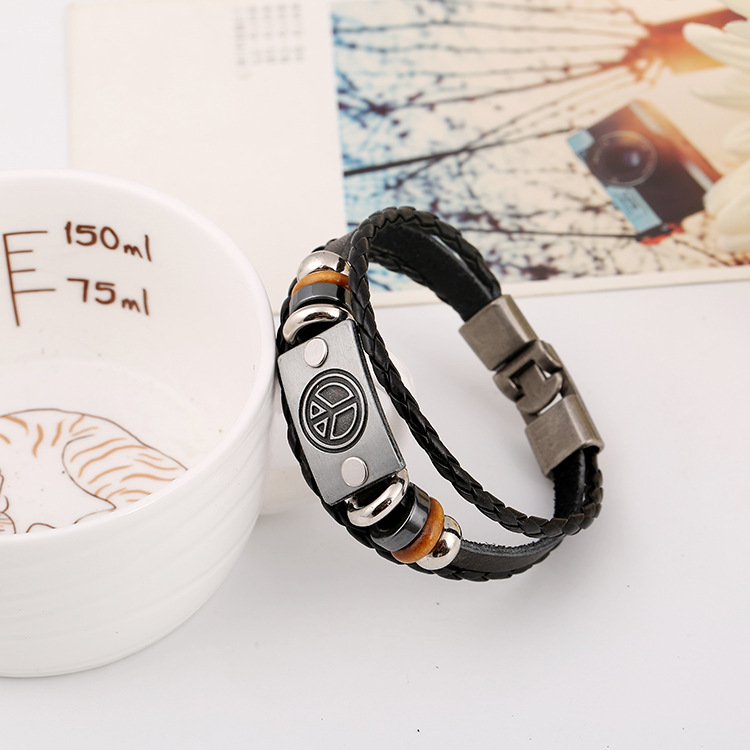 Décontracté rétro simple tissé à la main en cuir perlé bracelet alliage paix signe en cuir punk vent homme main corde populaire