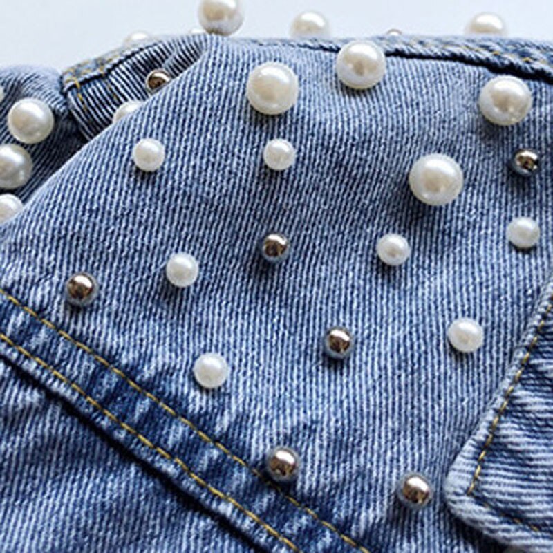Giacca di jeans per ragazze primaverili e autunnali 2024 autunno coreano nuova giacca cardigan con bottoni superiori con risvolto dolce manica lunga allentata