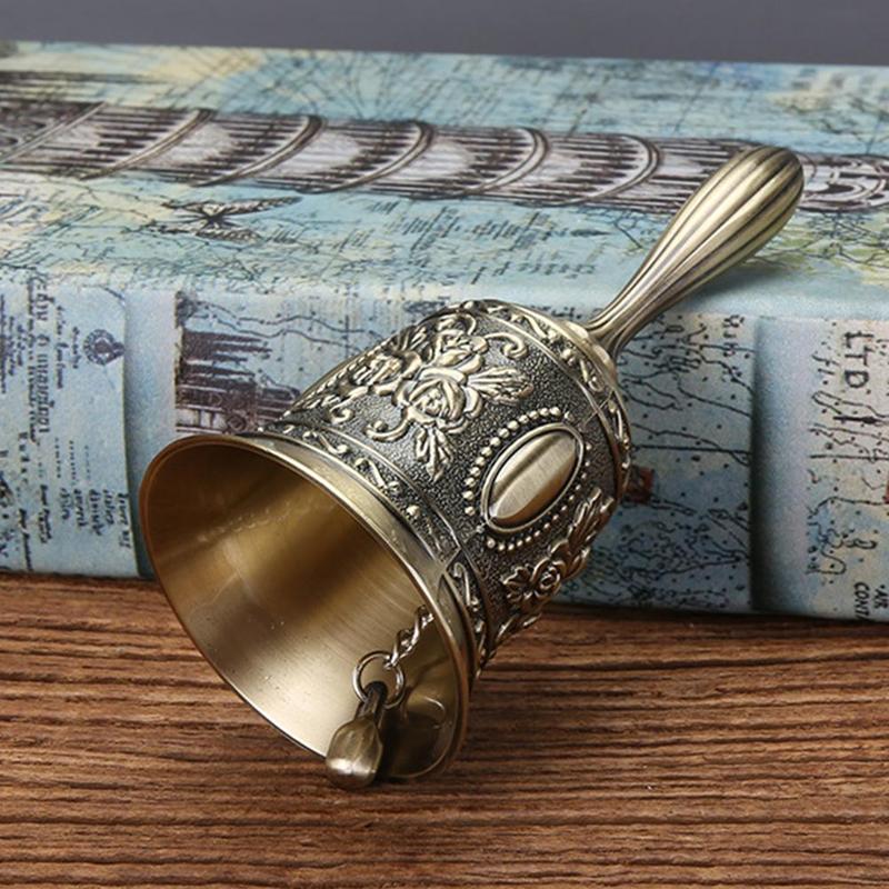 1Pcs Hand Bell Metal Tone Koperen Ring Alarm Hand Hold Dienst Call Bell Desktop Bel Thee Dinner Bells Game bells Xmas Klokken