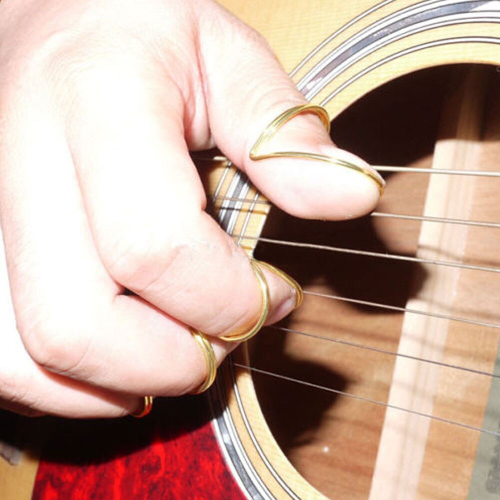 Púas de guitarra de 4 Uds., anillo de Metal de protección, púas de dedo pulgar para guitarra bajo