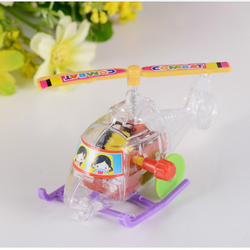 1 stks Baby Kids Kinderen Helicopter Wind Up Speelgoed Plastic Vliegtuigen Wind Up Uurwerk Speelgoed Christmas Kleur Willekeurige