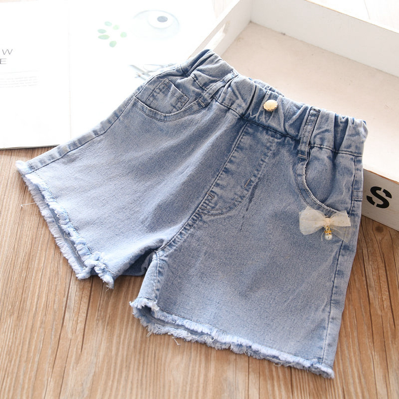 Primavera/estate 2022 pantaloncini di jeans con fiocco per ragazze abbigliamento per bambini all'ingrosso: beige bow