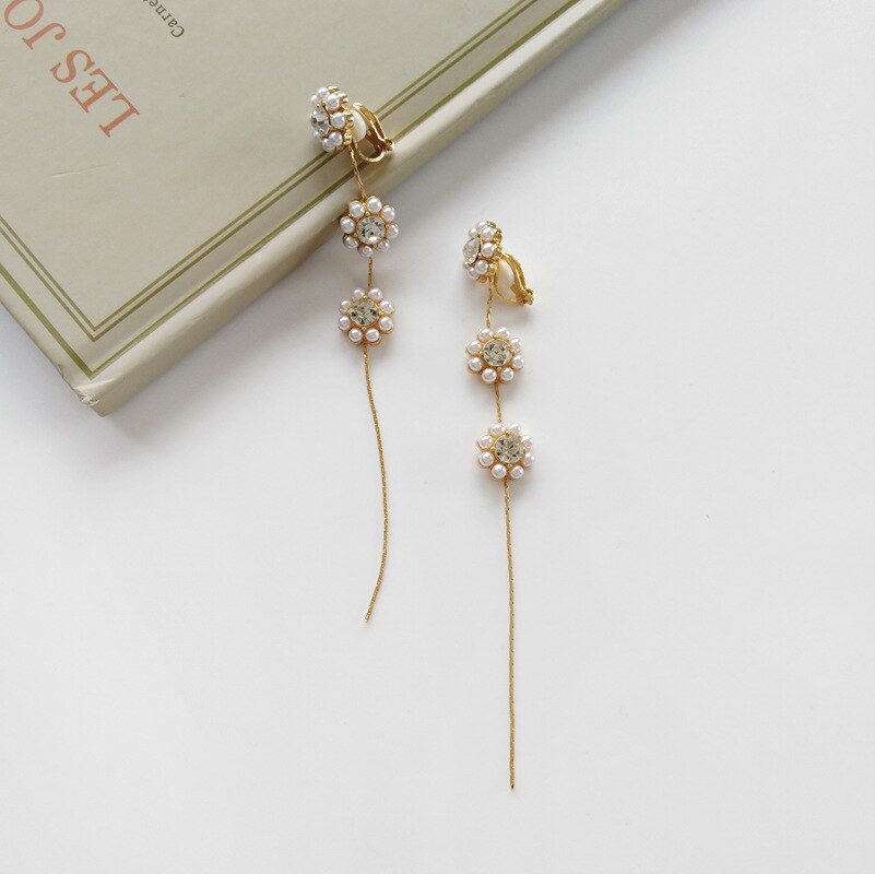 Tempérament coréen Ins Simple longue fleur pince sur boucles d'oreilles français strass Long gland perle oreille Clips boucles d'oreilles pas de Piercing