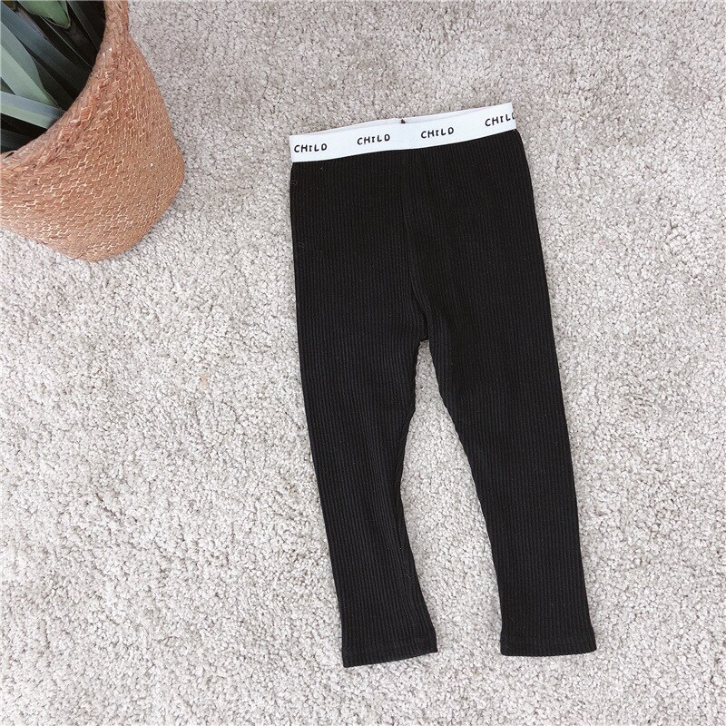 Lente jongens en meisjes snoepkleurige elastische taille gebreide broek kinderleggings broek met letter taille broek: Zwart / 18m