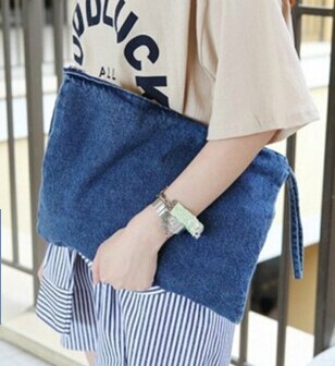 017 South Korea female clutch bag holding pure color washed cowboy hand grasping purse: Blue