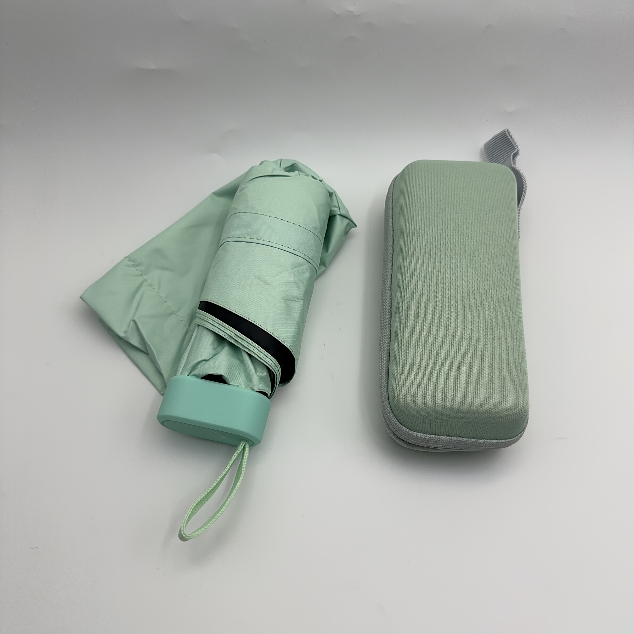 Paraguas cápsula portátil Mini sombrilla protector solar paraguas de lluvia mango de aleación de caucho negro plegable sol lluvia doble uso: violet