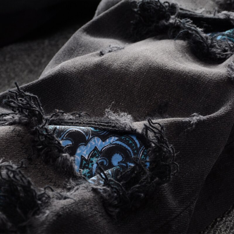 jeans da uomo alto strada la moda jeans strappati sottile in forma elasticizzati neri retrò per uomo pantaloni punk in denim anca-salto firmati patchwork