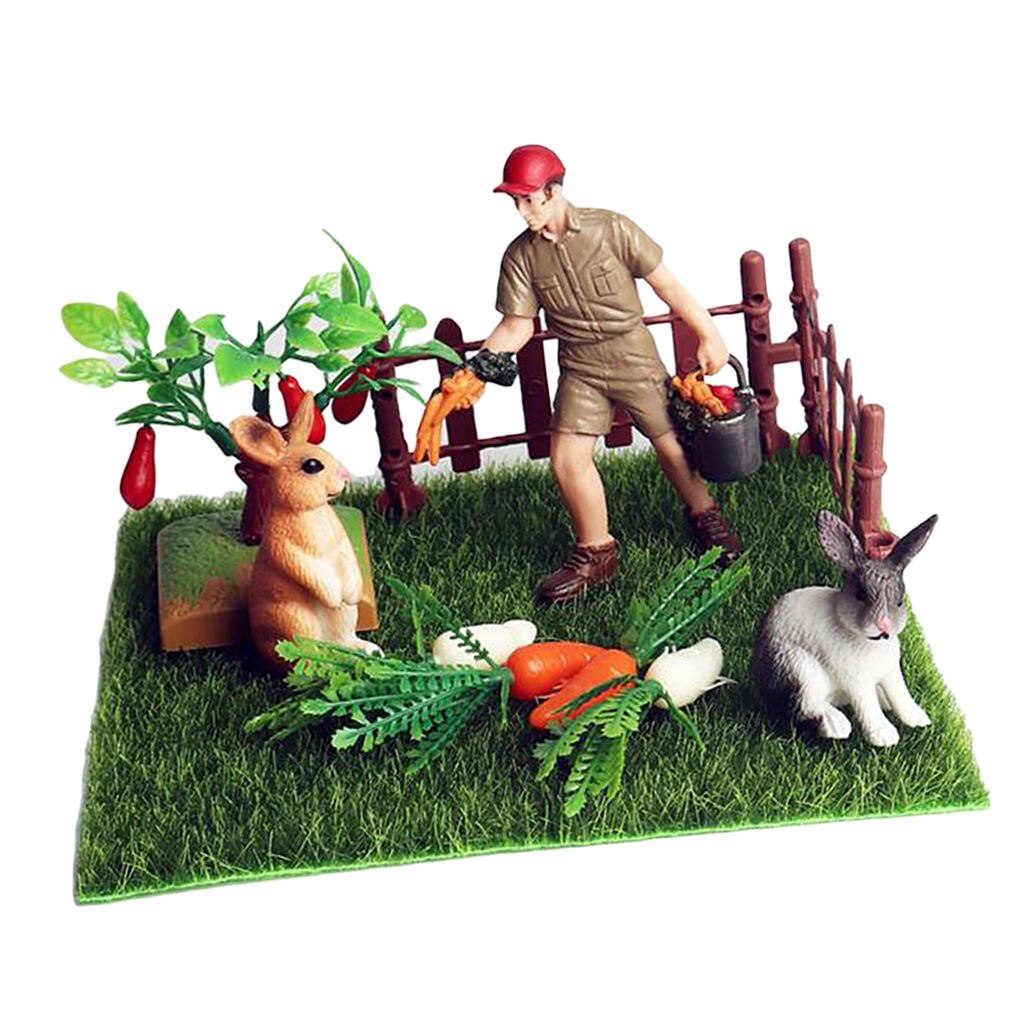 Miniatur-mikrolandschaftsdekoration mit kaninchen und karotten (nahaufnahme)