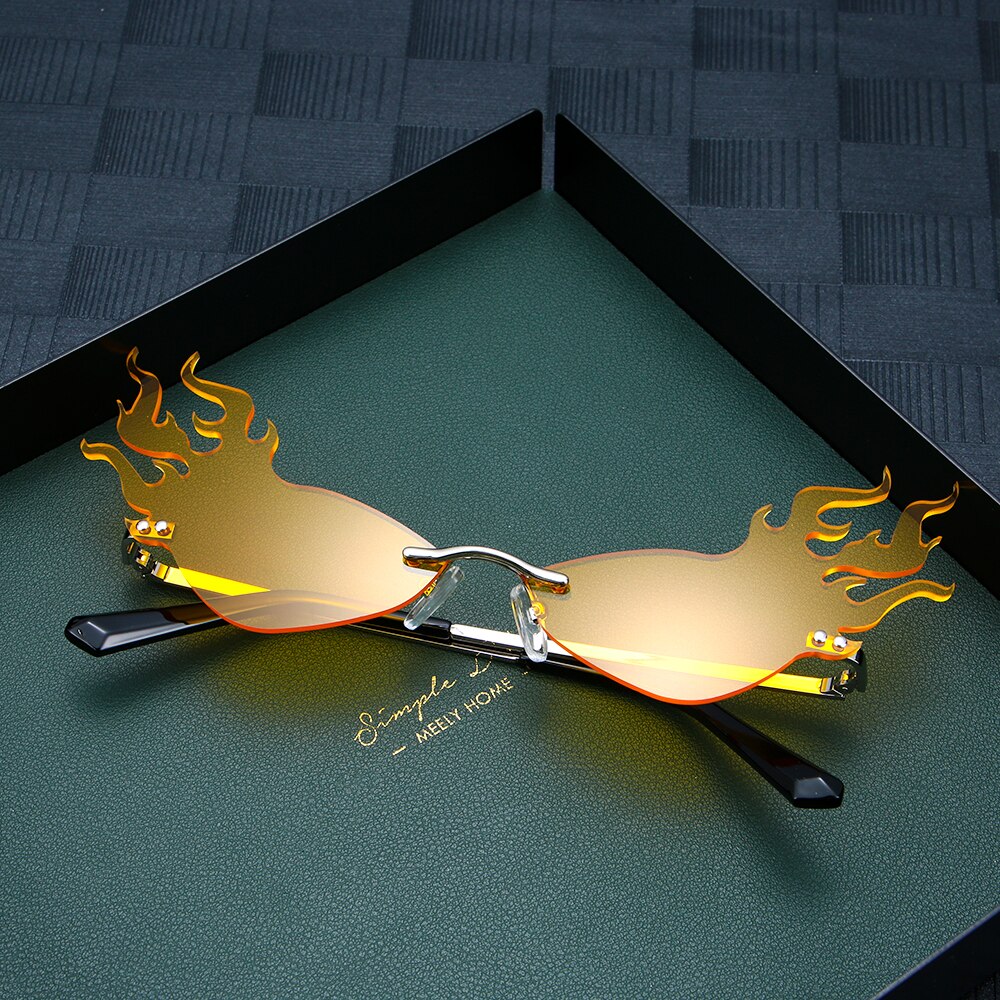 Nowy ogień płomień okulary mężczyźni kobiety Rimless Wave UV 400 luksusowe trendy Streetwear kolarstwo akcesoria zewnętrzne: C04 Orange