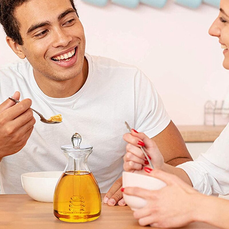 Handgemaakte honingpot met dipsaus, glazen honingdipsaus en honingpot