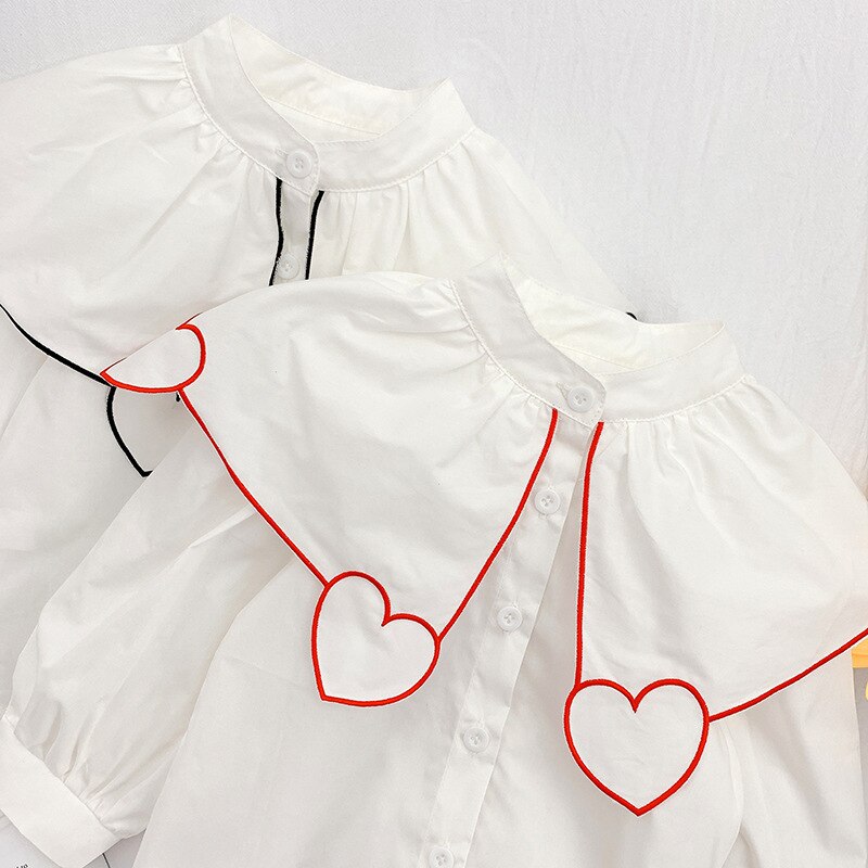 Blusa blanca con bordado de corazón para niños, ropa básica ancha con cuello vuelto, 2 años