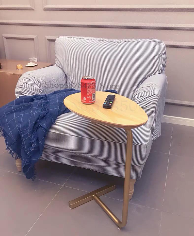 Nordisk minimalistisk soveværelse sengebord oval massivt træ læsebord balkon lille sofabord sofa mini hjørnebord: Gnister  fy 11