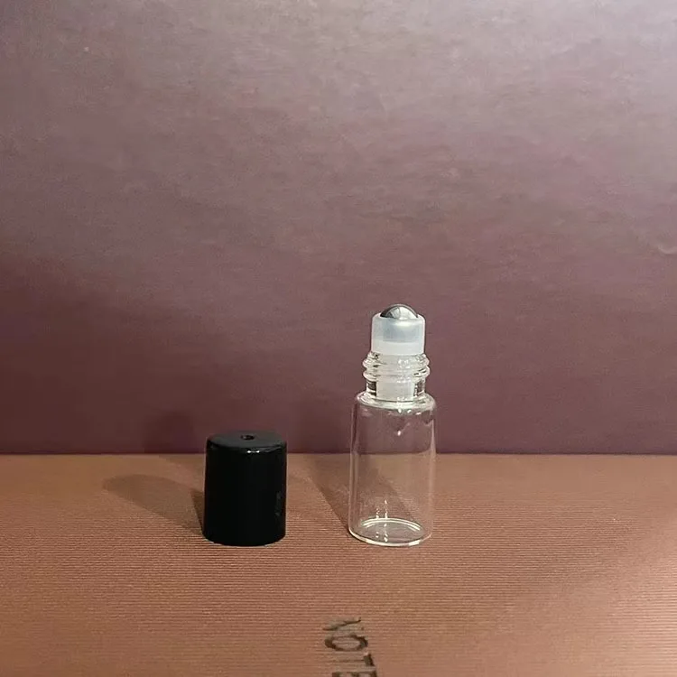 50 sztuk 1ML/2ML/3ML/5ML przezroczysta butelka szklana rolka butelka z kulką na olejku eterycznym czarne puste fiolki podróżna butelka perfum: zielone światło / 10 ml