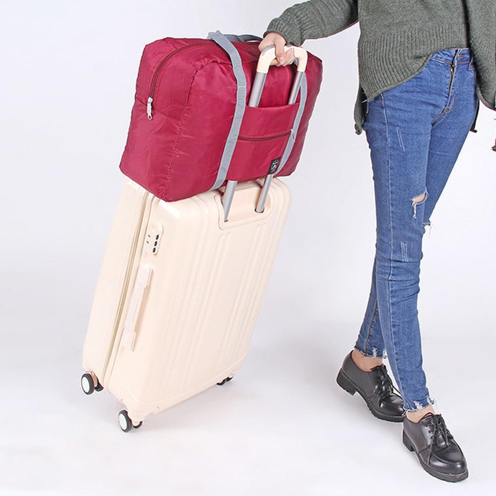 Gnwxy 2020 nova náilon dobrável saco de viagem grande capacidade moda fim de semana bolsa para homens mulheres carry on sacos de bagagem dropshipping