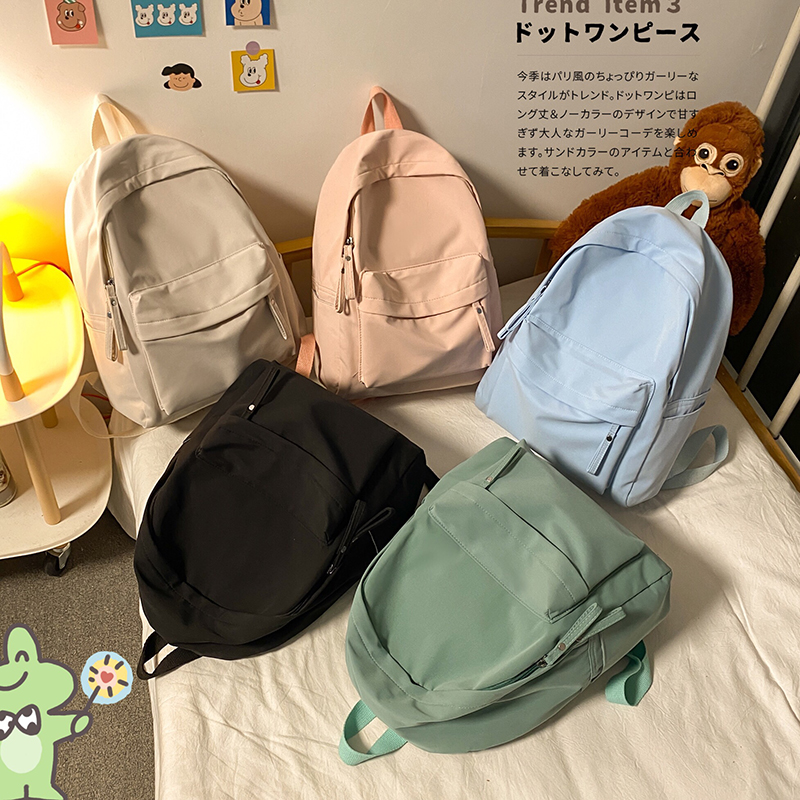 Mochila Simple de Color sólido para mujer, mochilas escolares de nailon impermeables para adolescentes y niñas, mochila de viaje para mujer, bolso de hombro 2022