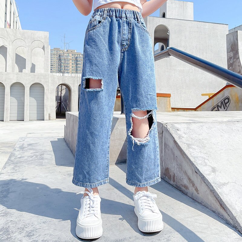 New Teen Girl Fashion pantaloni strappati in Denim con foro in cotone 2021 estate bambini colore blu vita alta Jeans larghi alla caviglia