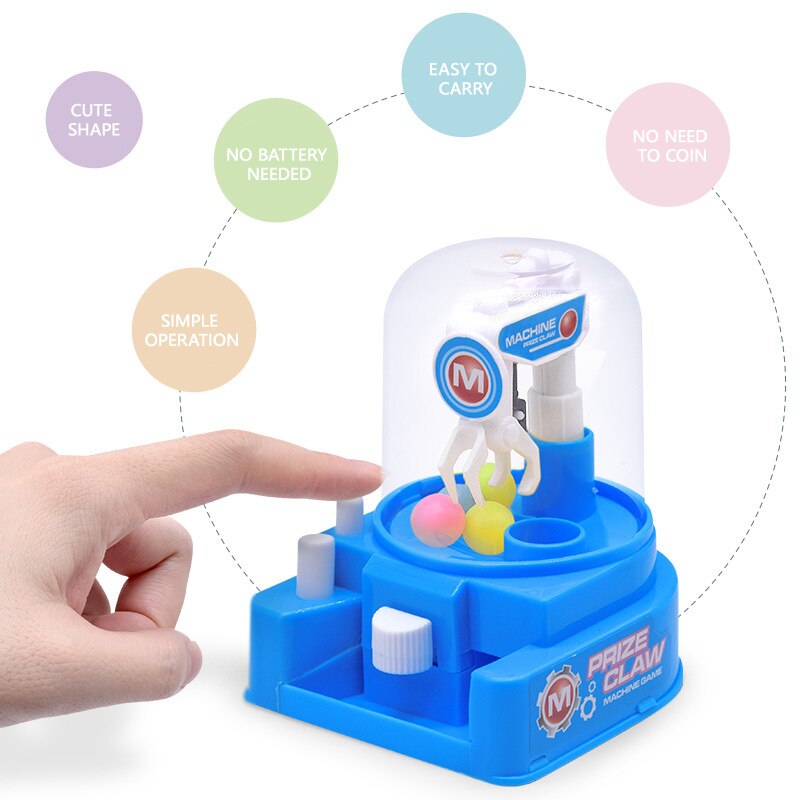 Bedst sælgende børns mini grab og fang klip slik maskine legehus fange bold maskine lille kapsel maskine legetøj
