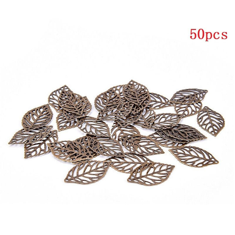 50 st hantverk vintage pläterad retro guld charm filigran ihåliga blad hänge smycken tillbehör smycken gör diy: Brons